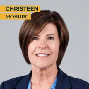A woman with short brown hair in a navy blazer smiles at the camera. The name "Christeen Moburg" appears in yellow boxes at the top left.